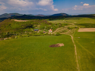 Beautiful view of a green landscape with a village on a sunny day