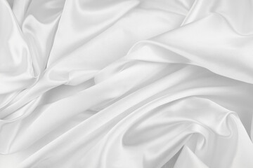 Wall Mural - Close-up of rippled white silk fabric sheet texture