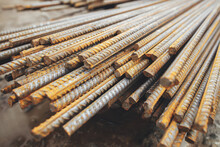 Reinforcement Rods At Construction Site. Steel Rebar Close Up. Rusty Steel Reinforcement Bars For Concrete. Process Of House Building