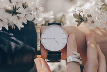 Beautiful Stylish White Watch On Woman Hand. Close-up Photo.