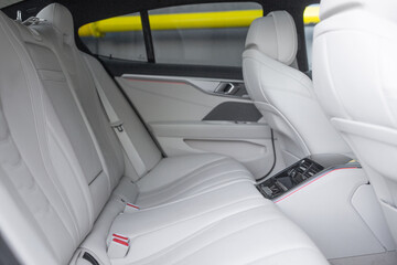 Sticker - Luxury car rear seats row. Expensive car leather seats view from the front seats.