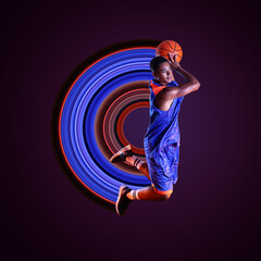 Wall Mural - Poster with young jumping African-American basketball player on dark background