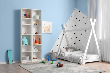 Wall Mural - Interior of children's room with modern furniture and rugby ball on floor