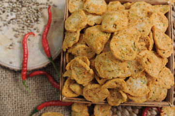 Wall Mural - Beautiful shot of spicy fried meat balls on a bamboo plate