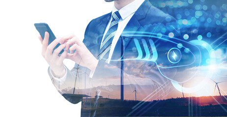 Wall Mural - Businessman using smart phone charging application, wind turbine energy charging cable plug station concept, Electric power smart car eco clean environmental energy fuel, background double exposure.