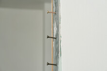 Half-screwed Screws In The Metal Profile Of The Frame Of The Doorway
