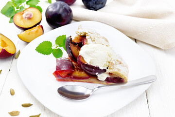 Poster - Galeta with plums in plate on wooden board