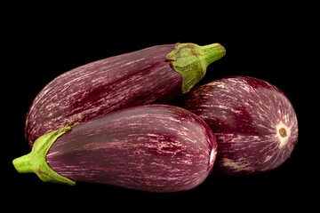 Wall Mural - Eggplant vegetable closeup isolated on black