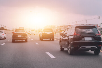 Wall Mural - Car driving on road and Small passenger car seat on the road used for daily trips