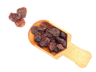 Wall Mural - Raisin in scoop and bunch isolated on white background. Macro. Healthy food concept