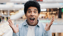Male Portrait Emotions Enthusiastic Surprised Shocked Amazed Man African American Guy Teenager Looking At Camera Opens Mouth And Eyes In Surprise Delight Winning Victory Luck Success Discount Offer