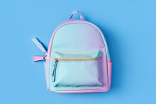 School Backpack In Pastel Color On Blue Background. Concept Back To School.