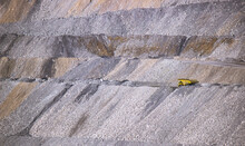 Yellow Dump Truck Carting Overburden In An Open Cut Coal Mine