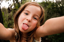 Selfie Of A Girl Being Silly Sticking Out Her Tongue