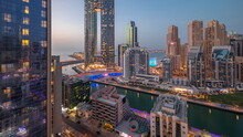 Dubai Marina Skyscrapers And JBR District With Luxury Buildings And Resorts Aerial Day To Night Timelapse
