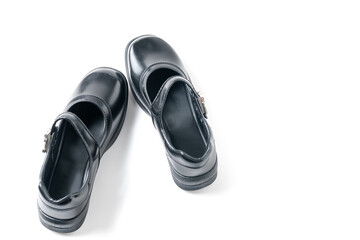 Wall Mural - top view of Black girl student shoes isolated on white background,