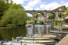 Boats On The River Nidd Towards The Viaduct In The Town Of Knaresborough In Yorkshire, UK In Summertime