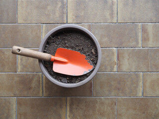 Wall Mural - garden spade and earth bucket for potted plant