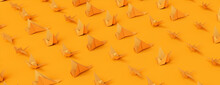 Birds Made From Folded Orange Paper Against Orange Background. Origami Concept Banner.