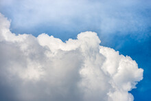 Beautiful Storm Clouds, Cumulus Clouds Or Cumulonimbus Against A Clear Blue Sky. Photography, Full Frame, Sky Only.