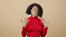 Young Black Woman In Red Sweater Feeling Unguilty Outstretching Arms And