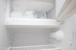 The refrigerator freezer is full of ice. Defrosting is required