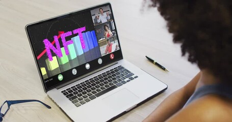 Wall Mural - African american businesswoman using laptop for video call with diverse business colleagues