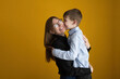 © ADDICTIVE STOCK - Loving mother hugging happy son