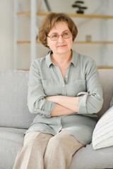 Sticker - Close-up portrait of a older woman at home