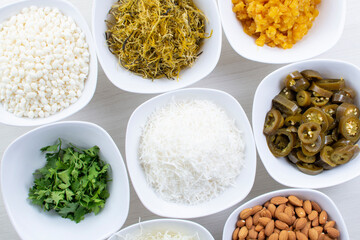 Sticker - Variety of topping, ingredients to accompany sushi, displayed in white container