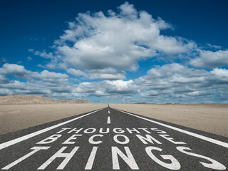 Wall Mural - Thoughts Become Things quote on highway for motivational concept.