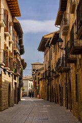 Poster - narrow picturesque street in the historic old town pedestrian zone of Olite