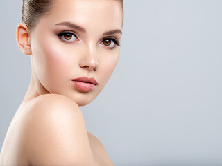 closeup portrait of a face of the young pretty girl with a healthy skin. beautiful face of young whi
