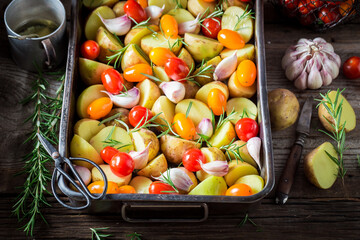 Wall Mural - Tasty baked potatoes as perfect dish for grilling.