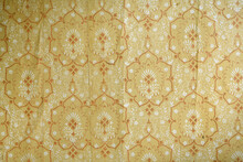 Old Torn Wallpaper On The Wall.Old Wallpaper For Texture Or Background.