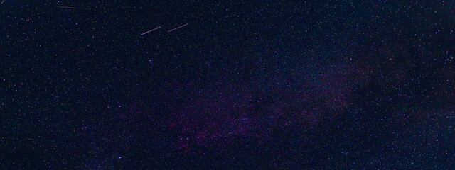 Wall Mural - tellar Milky Way at night with stars. Panorama of the dark blue starry sky
