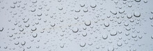 Water Drops On Glass, Gray Background, Close-up
