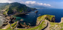 Long And Winding Stone Stairs Leading Up To The Church Of San Juan De Gaztelugatxe With A View Of The Coast Of The Spanish Basque Country
