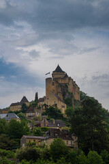 Poster - vertical view of the castle in Castelnaud-la-Chapelle in the Dordogne Valley under an overcast sky