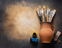 Paint Brush In Clay Jug And Art Painter Tool On Abstract Background Texture. Paintbrush Painting