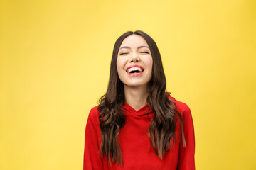 Sticker - Happy cheerful young woman rejoicing at positive news or birthday gift, looking at camera with joyful and charming smile. student girl relaxing indoors after college