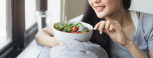 Eat Healthy Food On Wellness Lifestyle. Beauty Young Woman Eating Salad As A Breakfast.