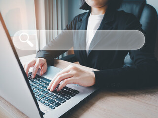 Wall Mural - businessman using laptop to search for information via the internet digital search icon