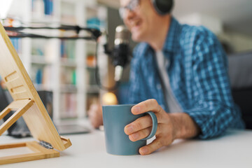 Wall Mural - Professional speaker recording a live podcast