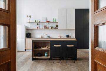 Wall Mural - Kitchen interior with wooden cabinet, dining table and countertop