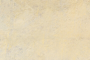 Sticker - stone wall with yellow paint. textured surface