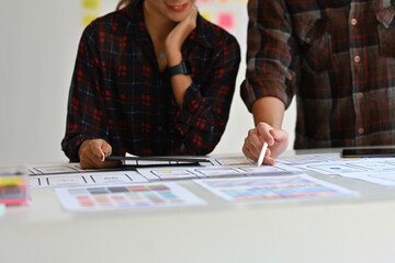 Wall Mural - close up with ux and ui designer and developer create mobile app interface wireframe design with cus