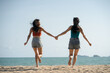 © phonix_a - Asian happy friends is having fun at beach .