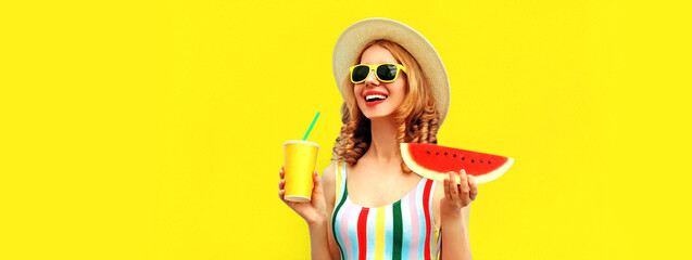 Summer portrait of happy cheerful laughing woman with fresh cup of juice and slice of watermelon wearing straw hat, sunglasses on yellow background, blank copy space for advertising text