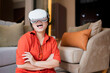 © whyframeshot - exitied enjoy 3d virtual gaming futuristic experience young asian female wear vr headset technology watching simulation digital world hand gesture control herself to beat the online fun virtual gaming